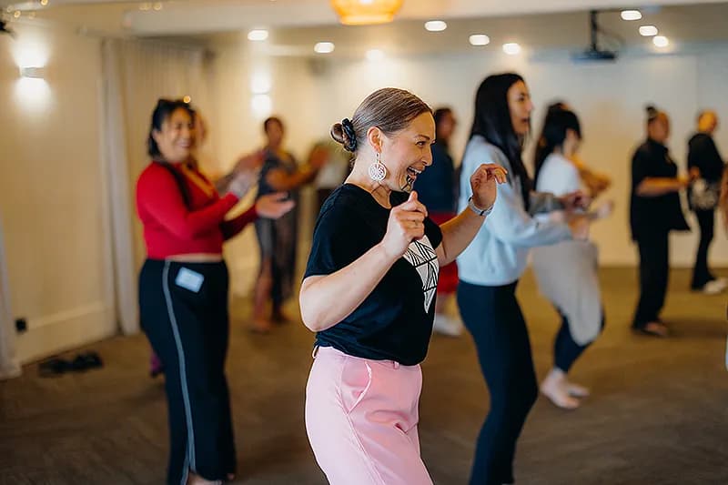 Wāhine of Māia Collective dancing together